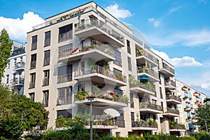 Gray modern multi-family house with balconies