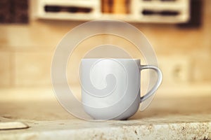 Gray mug on kitchen work surface