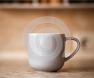 Gray mug on kitchen work surface