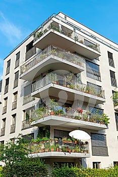 Gray multi-family house with balconies