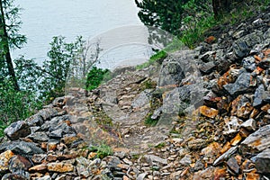 Gray old boulders on hillside