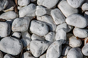 Gray pebbles as backfilling a path