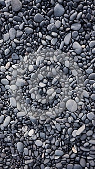 Gray pebbles as a background in the Iceland sea shore. Abstract composition