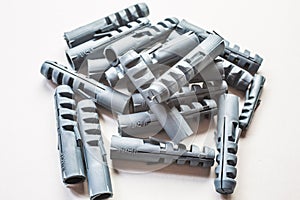 Gray plastic dowels for wall mounting