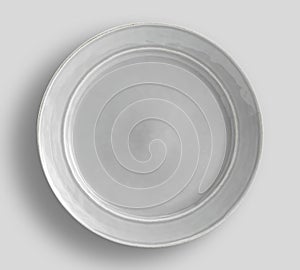Gray plate on white background - Image photo