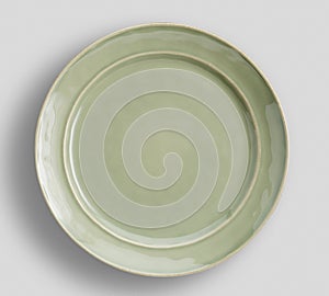 Gray plate on white background - Image photo