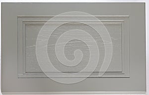 Gray rectangular kitchen facade close-up. Natural wooden textured decorative background element