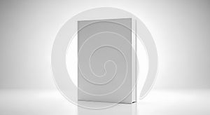 A gray rectangular object standing upright on a white surface and background