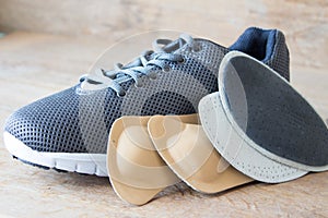 Gray running shoes with orthopedic insoles