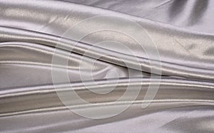 Gray satin glitter luxury fabric background with copy space
