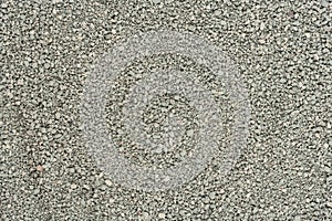 Gray small rocks ground texture. black small road stone background. gravel pebbles stone seamless texture, marble. dark background