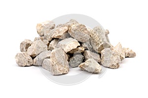 Gray small rocks ground texture isolated on white background. Small road stone