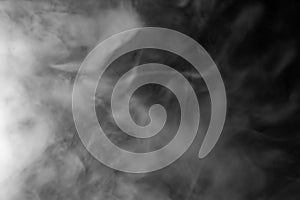 Gray smoke on a black background, abstract background