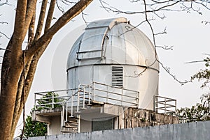 Gray Stained Observatory with Spiral Staircase in Cloudy Day