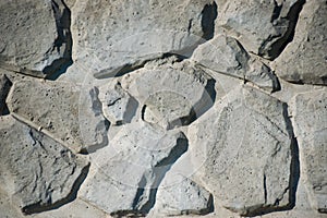Gray stone wall background. Texture of painted brick.