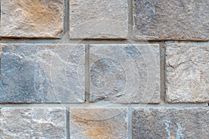 Gray stone wall closeup background texture