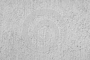 Gray stucco on wall of house.
