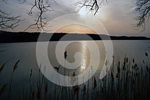 Gray sunset over pond