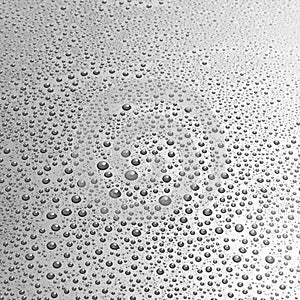 Gray surface covered with water droplets