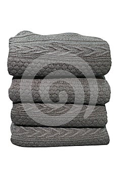 Gray sweater folded stack isolated on white background