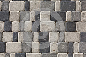 Gray texture pattern of rough stone on the road