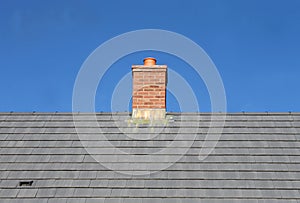 Gray tile roof and chimney