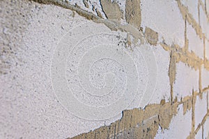 Gray wall of foam blocks on glutinous solution