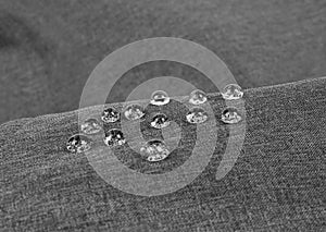 Gray waterproof fabric with waterdrops close-up