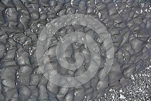 Gray wet mud background