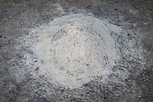 Gray white ash ashes pile heap stack from burnt campfire lumber