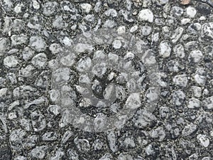 Gray, white and black stone wall background.