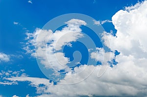 Gray white clouds. Clouds of thunderclouds on a blue sky. Summer day. Beautiful nature background