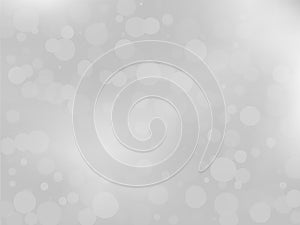 Gray-white gradient background with bokeh effect. Abstract blurred pattern. Overlapping transparent bubbles Vector illustration