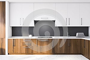 Gray and white kitchen interior with countertops