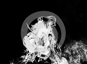 Gray, white smoke in the dark on a black background, isolated steam, fume, dry ice