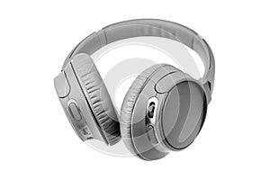 Gray wireless headphones on white background isolated closeup, big grey bluetooth headset design, modern black wi-fi earphones