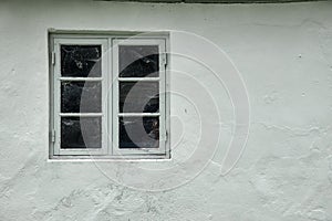 Gray wood colonial style window