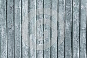 Gray wood vertical planks in rustic style. Grunge background of construction material. Wooden texture board. Pattern of grey old f