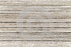 gray wooden background. Old dry boards. Wood texture. bridge or pier in the village near the river