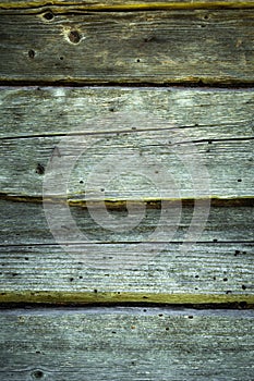 Gray wooden background from old logs in the wall. creative artistic backdrop in rustic grunge style