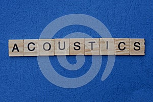 Gray word acoustics from small wooden letters