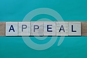 Gray word appeal made of wooden square letters