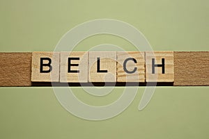 Gray word belch from small wooden letters photo