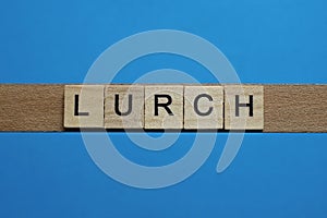 Gray word lurch in small square wooden letters