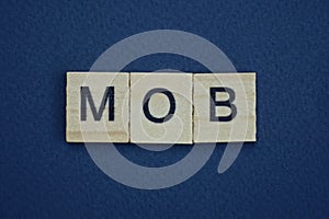 Gray word mob from small wooden letters