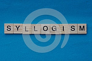 Gray word syllogism from small wooden letters