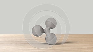 Gray xrp ripple silver sign icon on wood table white background. 3d render isolated illustration, cryptocurrency, crypto, business