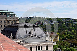 Gray zink metal mansard roof on historic building in Budapest