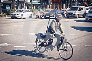 Graybeard in bicycle