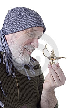 Graying Arab man with lamp